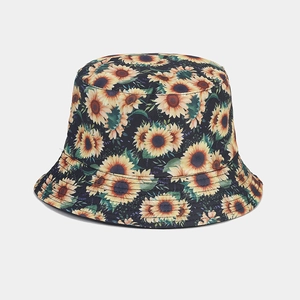 Reversible sunflower print bucket hat in black canvas for outdoor sun protection