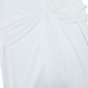 Detailed close-up of the knot design and pleated texture on white long sleeve dress