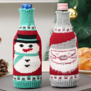 Knitted Christmas wine bottle covers featuring Santa Claus and Snowman designs