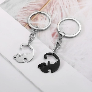 Matching black and silver cat couple keychains in stainless steel for bag charm