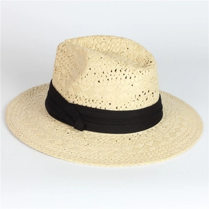 Classic wide brim Panama straw hat in beige with black ribbon for beach sun protection