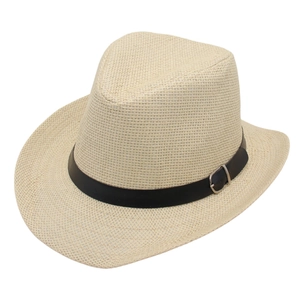 Close-up of beige woven straw hat with black leather band and silver metal buckle detail