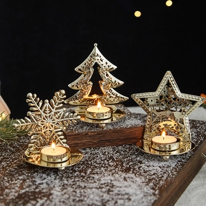 Golden Christmas hollow metal candle holder set with snowflake and tree designs