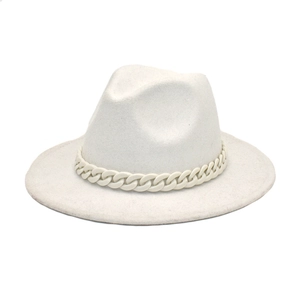 Close-up of white wide brim wool fedora with decorative acrylic chain detail