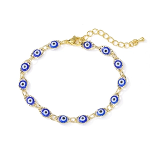 Golden chain bracelet featuring blue evil eye charms with lobster clasp closure