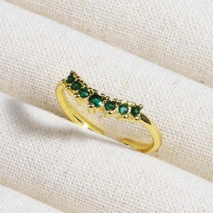 Minimalist 18K gold plated ring with micro-paved emerald green zircons in curved row