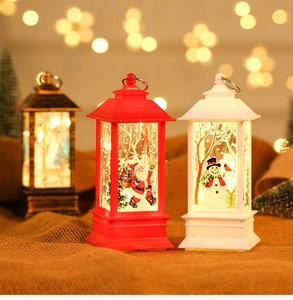 Macro shot of LED Christmas lanterns with warm lights and festive Santa patterns