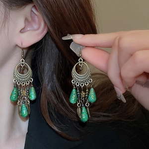 Bohemian bronze leaf earrings with green waterdrop beads and vintage ethnic tassels
