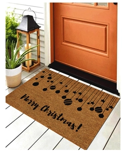 Detail of Christmas doormat with Merry Christmas text and hanging ornaments pattern
