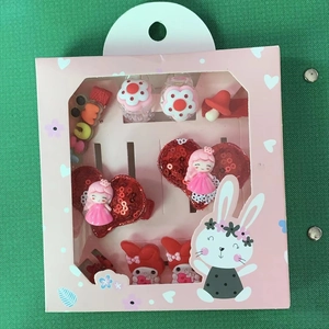 Rosa und rotes Kinder-Haarschmuck-Set mit Schleifen und Clips in einer Hasenbox