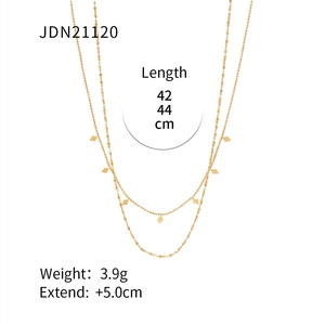 Detail of 18K gold plated double layer beaded chain with tiny rhombus pendants