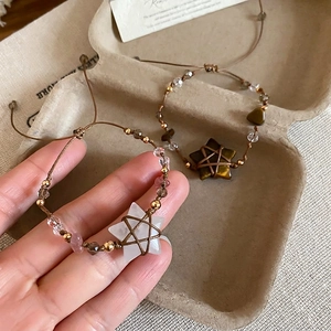 Ethnic handmade star stone bracelet with natural crystal beads and brown woven rope