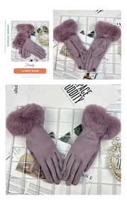 Close-up of purple suede gloves featuring warm faux fur cuffs and flower embroidery detail