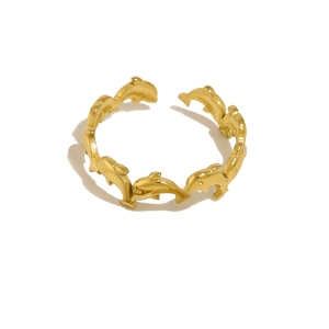 Close-up of golden starfish ring with ocean style design on a clean white background