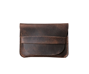 Detail view of dark brown crazy horse leather card holder with vintage handmade stitching
