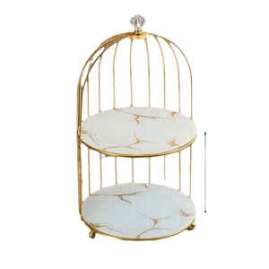 Golden birdcage double-layer organizer with white marble trays and crystal knob