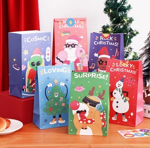 Close-up of colorful cartoon Christmas paper gift bags with festive illustrations