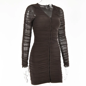Close-up of black mesh mini dress with detailed ruched texture and front zipper