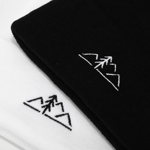 Outdoor knit beanie with mountain embroidery in black and white styles for winter warmth