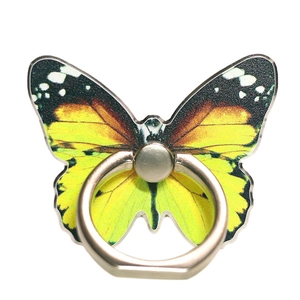 Close-up of butterfly phone ring holder with vibrant orange and yellow painted patterns