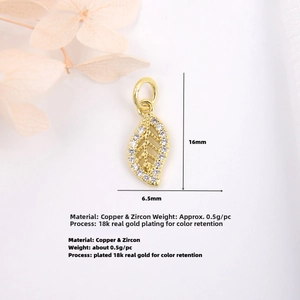 Detailed view of 18k gold plated leaf pendant with white zircon and size measurement