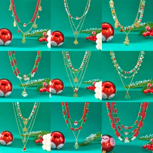 Colorful Christmas layered beaded necklace with festive charms and HOHO alphabet beads