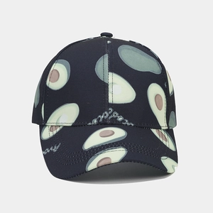 Close-up of navy baseball cap with all-over avocado print and avocado text detail