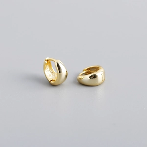 Detailed close-up showing the S925 silver hallmark and polished gold finish on wide hoop earrings