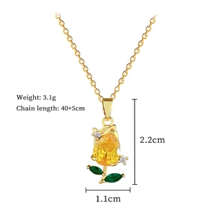 Detailed view of champagne gold tulip pendant with pear-cut yellow gem and sizing metrics