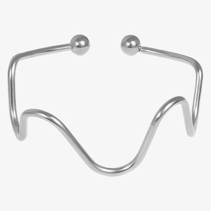 Close-up of silver wavy stainless steel open bangle with spherical bead ends