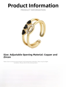 Macro detail of open adjustable double-layer heart ring with cubic zirconia