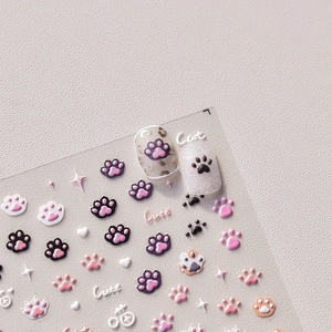 3D embossed cat claw and heart nail art stickers in pink and white for cute manicure
