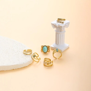 Set of 7 gold stainless steel rings with turquoise and pearl on elegant stone decor