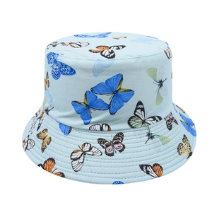 Detail of light blue bucket hat with colorful butterfly print and reinforced stitching
