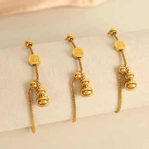 Golden titanium steel bracelet with gourd charm and Fu character pendant