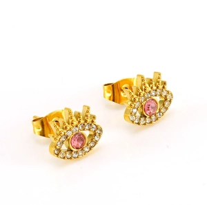 Detail of eye-shaped stud earrings with pink zircon center and small white crystals
