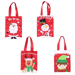 Set of four colorful Christmas felt gift bags featuring Santa, snowman, and reindeer designs