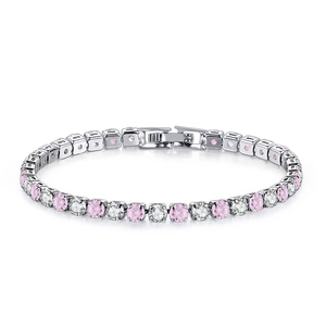 Close-up of a silver tennis bracelet with alternating pink and clear round cubic zirconia