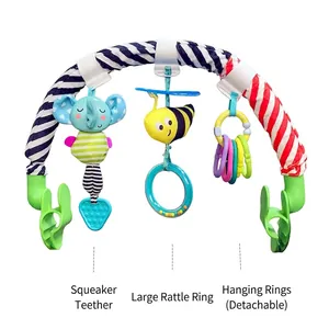Detail of baby stroller arch with rattle toys, colorful teethers and adjustable clips