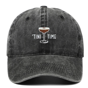 Close-up of Tini Time martini embroidery on vintage washed grey cotton baseball cap
