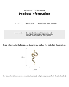 Detailed view of gold plated snake brooch with cubic zirconia and 6.2cm height scale