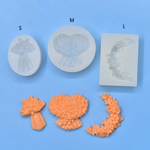Silicone flower bouquet molds in three sizes for DIY resin crafts on a blue background