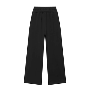 Pantalon large noir à taille élastique en maille douce présenté à plat sur fond blanc