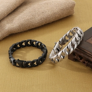 Detail of 15mm antique silver and matte black cuban chain bracelets with secure side locks