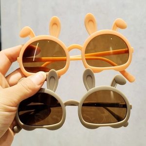 Cute bunny ear folding sunglasses for kids in matte orange-pink and gray frames