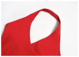 Detailed close-up of vibrant red V-neck halter yoga top showing high-quality stitching and fabric