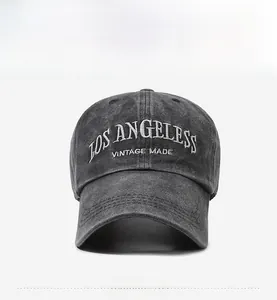 Close-up of vintage washed grey cotton baseball cap with white Los Angeles embroidery