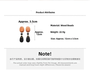 Detailed view of long wooden drop earrings with size 12cm x 3.5cm and 22.9g weight info