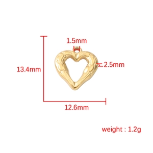 Detailed size specifications of the gold heart pendant with textured wing design