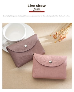Detail of lychee pattern leather coin purses in Morandi purple and rose pink colors